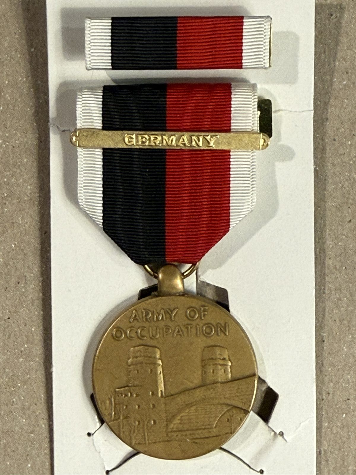 Army of Occupation Medal — the GERMANY clasp marks his duty in occupied Germany after V-E Day.