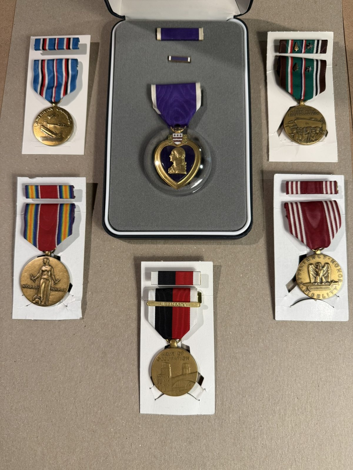 The full set together, the Purple Heart at its center.