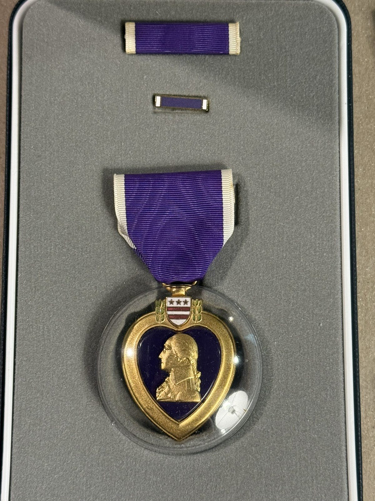 The Purple Heart — awarded for wounds received in action. George was hit near Düren, Germany, on 22 February 1945.